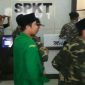 Rombongan GP Ansor tiba di Polda Jatim