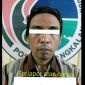 Tersangka (SD) saat diamankan di Mapolres Bangkalan.