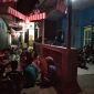 Pengurus Cabang PMII Pamekasan bersama warga dalam menyambut HUT RI ke-73.