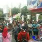 Massa dari KOMPAK saat melakukan aksi damai di alun-alun simpang lima Pati.