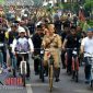 Presiden RI Joko Widodo saat bersepeda santai bersama 25  ribu peserta Gowes.