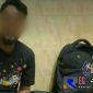 Pelaku HS saat diamankan di Mapolres Sampang.