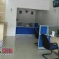 Terlihat karyawan Bank BTN tengah sibuk dengan aktivitas seperti biasanya.