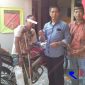 Tersangka JD saat diamankan di Mapolsek Kamal, Bangkalan.