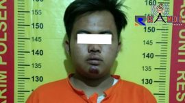 Tersangka FR saat diamankan di Mapolsek Kwanyar.