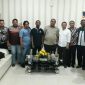 Kepala Dinas Perkim Kabupaten Gorontalo (Rahmat Doni Lahatie, SE.MH) saat foto bersama Tim Bank Dunia  dan Kementerian PUPR.