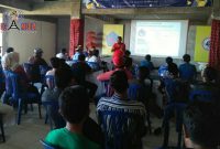 Kepala Desa Kutuh (Wayan Purja) saat menyampaikan sambutannya kepada peserta studi banding asal Robatal, Sampang, Madura.