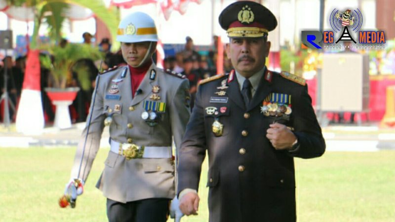 Kapolda Gorontalo (Brigjen Pol. Drs. Rachmad Fudail, MH) saat pimpin upacara HUT Bhayangkara Ke-73.