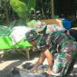 Satgas TMMD Kodim 0808/Blitar tengah melakukan kegiatan pembangunan desa.