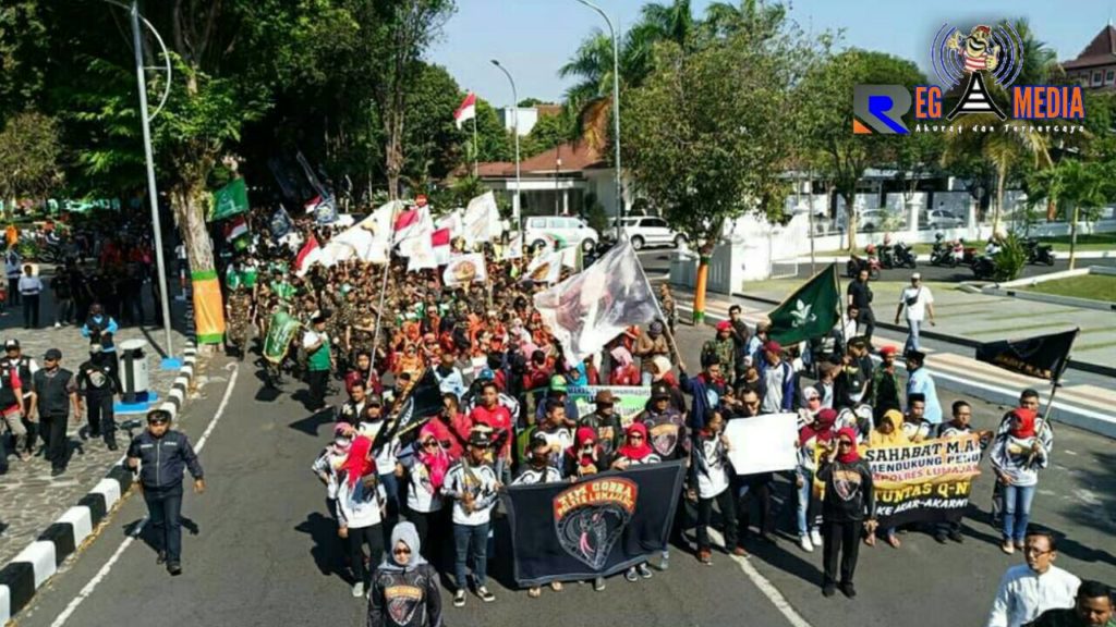 Ribuan Masyarakat Turun Jalan Dukung Polres Lumajang Brantas Kejahatan Bisnis Skema Piramida Q-net