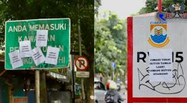 Tampak sejumlah rambu lalu lintas dan fasilitas umum ditempeli kertas putih.