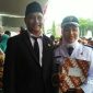 Kepala Desa Batukarang (Hj. Siti Wahyuni)  beserta suami usai dilantik di Pendopo Bupati Sampang.