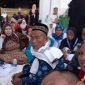 Foto adalah jamaah umroh asal Indonesia saat berada di sekitar Masjidil haram (ilustrasi)