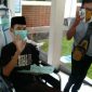 R, warga Kecamatan Blega pasca dinyatakan sembuh keluar dari rumah sakit RSUD Syamrabu Bangkalan, Jumat (17/4) kemarin.