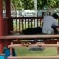 Pasangan pemuda-pemudi tengah asyik bercumbu di Taman Wijaya Kusuma, Sampang. 