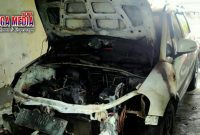 Satu unit Mobil Suzuki X-OVER SX4 Nopol BL 808 JS yang hangus terbakar.
