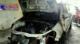 Satu unit Mobil Suzuki X-OVER SX4 Nopol BL 808 JS yang hangus terbakar.