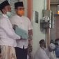 Pose bersama Bupati Bangkalan (R. Abd. Latif Amin Imron) dengan Ketua Paguyuban Pasar Ki Lemah Duwur Bangkalan (Lukman Hakim).
