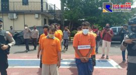 Polisi saat menggiring pelaku kriminal di wilayah Bangkalan.