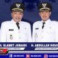 Foto Bupati dan wakil Bupati Sampang diapit oleh Kepala Desa Tobai Barat dan Kades Gunung Rancak.