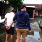 Satu terduga pelaku pembacokan saat pemilihan P2KD di Burneh digelandang ke Mapolres Bangkalan.