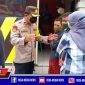 Kapolsek Asemrowo (Kompol Hari Kurniawan)  memberikan himbauan kepada warga agar tetap menerapkan protokol kesehatan.