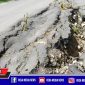 Tampak separuh jalan dalam kondisi retak dan ambruk di jalan raya Desa Blu'uran, Kecamatan Karang Penang, Sampang.