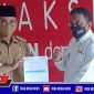 Rektor Universitas Trunojoyo Madura (Muh. Syarif) bersama Bupati Bangkalan (R. Abdul Latif Amin Imron).