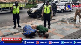 Operasi Yustisi, polisi saat memberikan sanksi push up kepada warga yang tidak menggunakan masker.