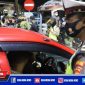 Polres Pelabuhan Tanjung Perak bersama tim gabungan saat melaksanakan Operasi Yustisi di sekitar tol Suramadu.