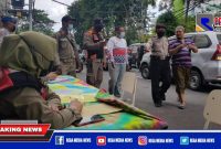 Polsek Pabean Cantikan bersama tiga pilar wilayah setempat saat melaksanakan operasi yustisi.