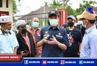 Bupati Aceh Selatan (Tgk Amran) saat bersama Kepala BPH Migas, M. Fanshurullah.