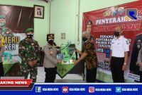 Kapolres Pelabuhan Tanjung Perak (AKBP Ganis Setyaningrum) saat menyerahkan bantuan peralatan penanganan Covid-19.