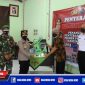 Kapolres Pelabuhan Tanjung Perak (AKBP Ganis Setyaningrum) saat menyerahkan bantuan peralatan penanganan Covid-19.