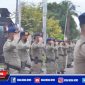 Caption: apel pelepasan satu kompi personel brimob di Bandara Djalaludin Gorontalo.