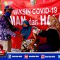 Caption: Ketua Katar The Brilliant Desa Batuporo Barat (Andre Efendi), tampak mendampingi warga saat disuntik vaksin.