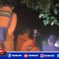 Caption: Tim Basarnas saat melakukan pencarian korban yang hilang di sungai Bolango, Gorontalo.