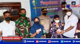 Caption: vaksinasi pada lansia saat penyaluran BLT DD terdampak Covid-19 di Sampang.