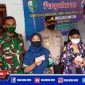 Caption: vaksinasi pada lansia saat penyaluran BLT DD terdampak Covid-19 di Sampang.