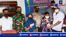 Caption: warga Sampang terdampak pandemi Covid-19 saat menerima BLT Dana Desa.