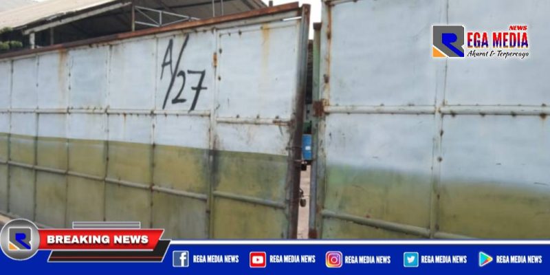 Caption: pagar gudang tempat pengelolahan minyak jelantah diduga bodong tampak tertutup.
