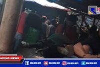 Caption: tampak keramaian dilokasi perjudian sabung ayam dan judi dadu, di Bakala, Jombang.
