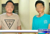 Caption: dua pelaku penipuan Hp bermodus COD diamankan di Mapolsek Pabean Cantikan Surabaya.