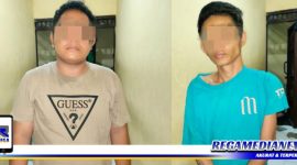 Caption: dua pelaku penipuan Hp bermodus COD diamankan di Mapolsek Pabean Cantikan Surabaya.