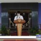 Caption: Bupati Bangkalan saat menyampaikan sambutan peresmian gedung baru DPRD Bangkalan.