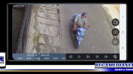 Caption: terduga pelaku penipuan terekam cctv.