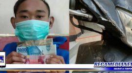 Caption: tersangka inisial DF dan barang buktinya diamankan di Mapolsek Kenjeran, Surabaya.