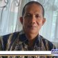 Caption: Ketua Kerukunan Keluarga Duri/Enrekang (KKD) Kabupaten Keerom (Murhan, SE).