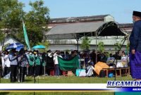Caption: saat berlangsungnya apel Kader NU di lapangan Mitra Kencana, Pangarengan, Sampang.