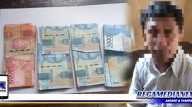 Caption: tersangka pencurian inisial AA dan sejumlah uang barang bukti diamankan polisi.